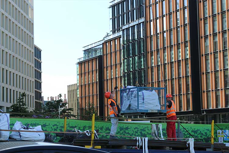 goods lifting cage in use
