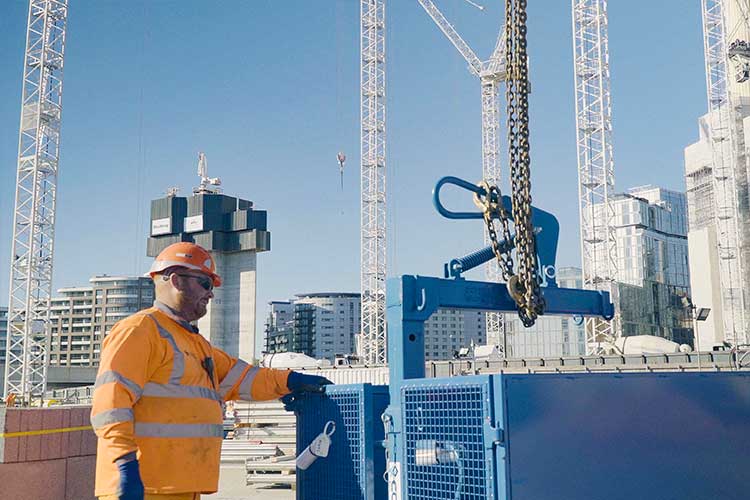 crane forks in use with a crane forks cage