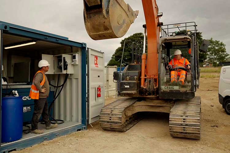 Conquip Fuel Eco-Hub on housebuilding site, excavator waiting for refule, Bridgebank
