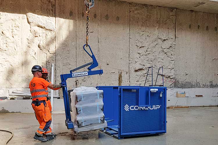 crane forks lifting pallet of material used with Conquip crane forks cage