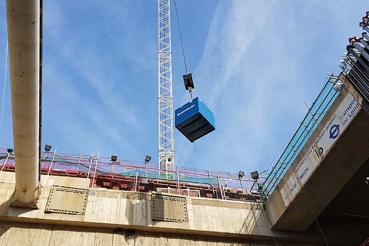 crane forks cage lifted by crane